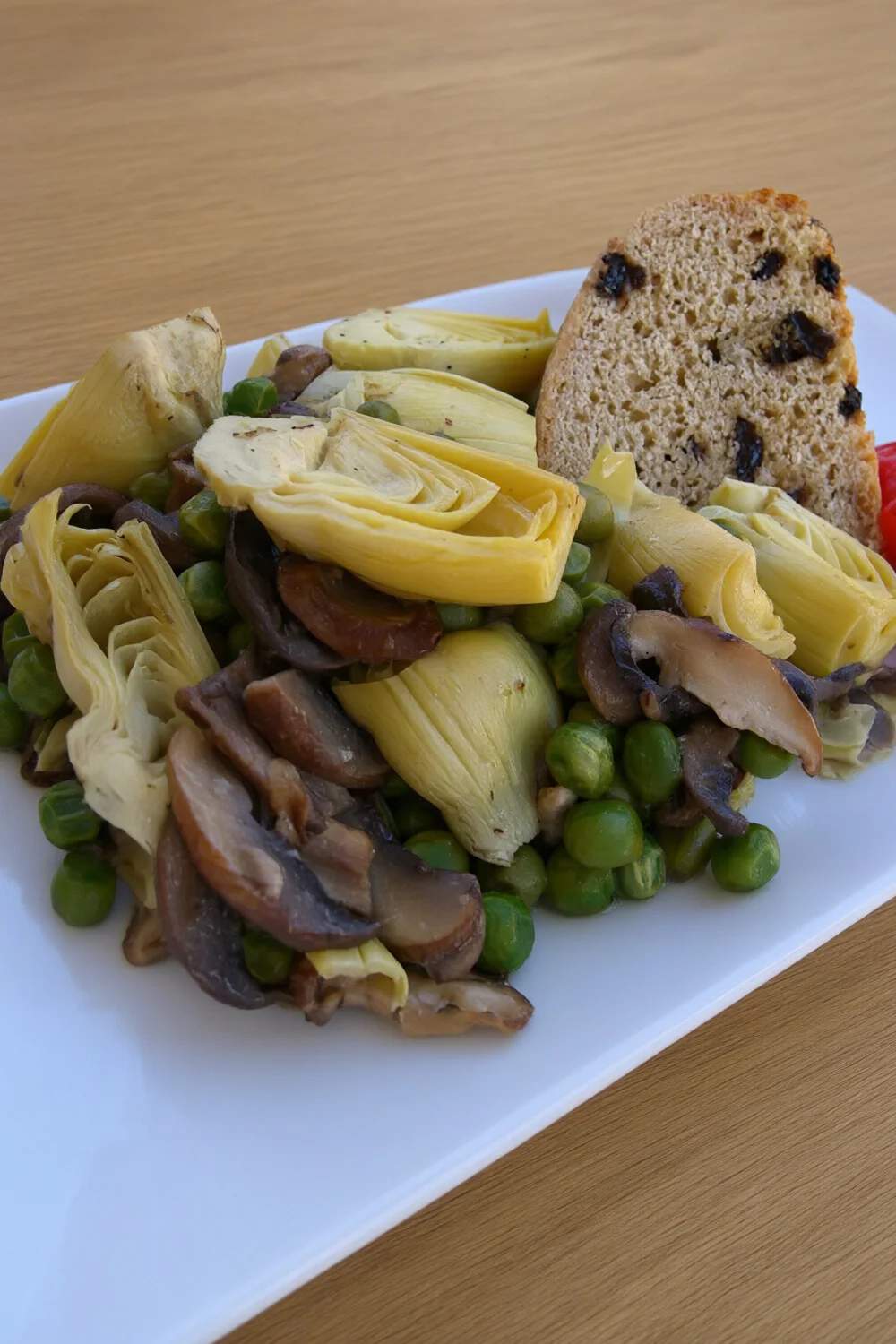 Artichoke Hearts, Green Peas and Mushrooms in a Lemon Sauce — European recipe