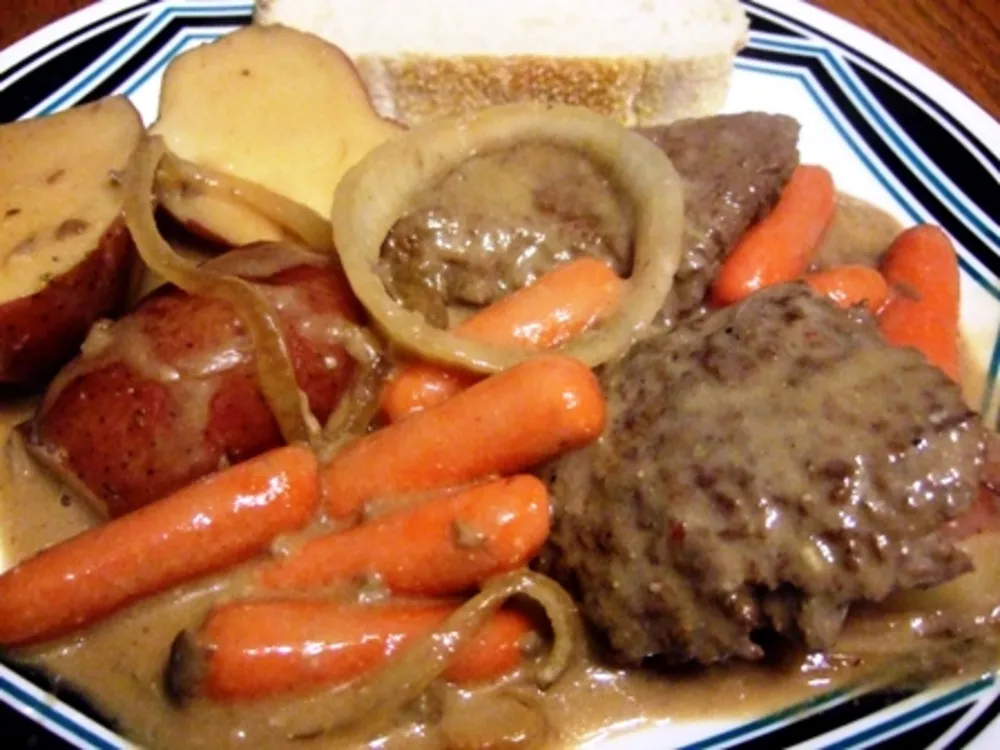 Slow Cooker Swiss Steaks With Beef Gravy, and Potatoes — Dinner & Mains recipe